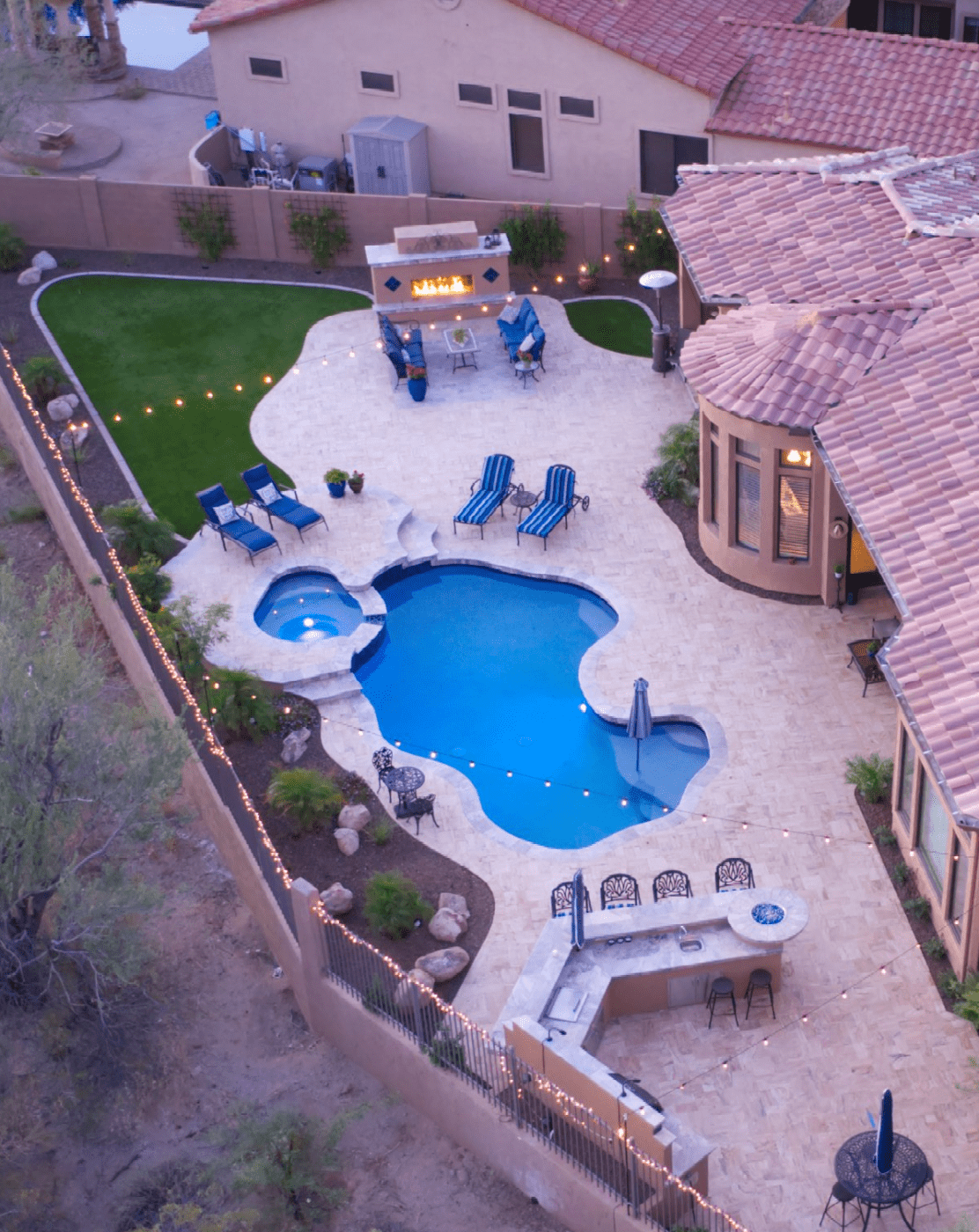 shot from above an Arizona backyard with turf and pavers. Landscaped by Chandler Artificial Grass